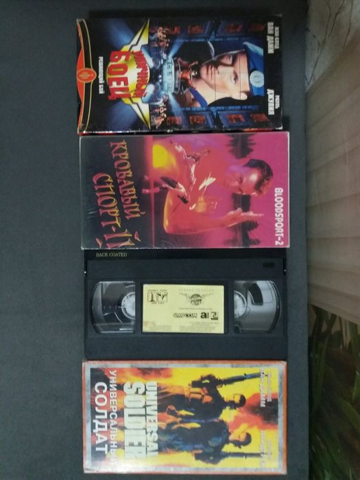 Фильмы видеокассеты Шварцегер Сталлоне Ван Дам Том Круз  Брюс Ли