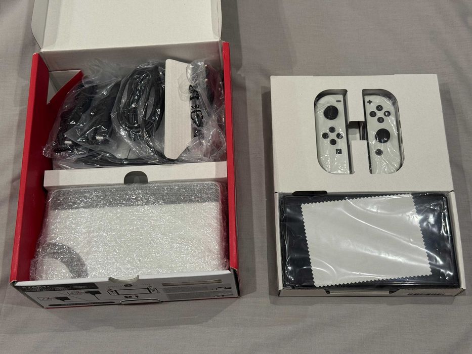 Nintendo Switch OLED with White Joy-Con + Legend of Zelda BOTW