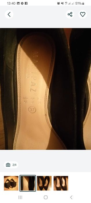 Sapatos pretos de salto alto