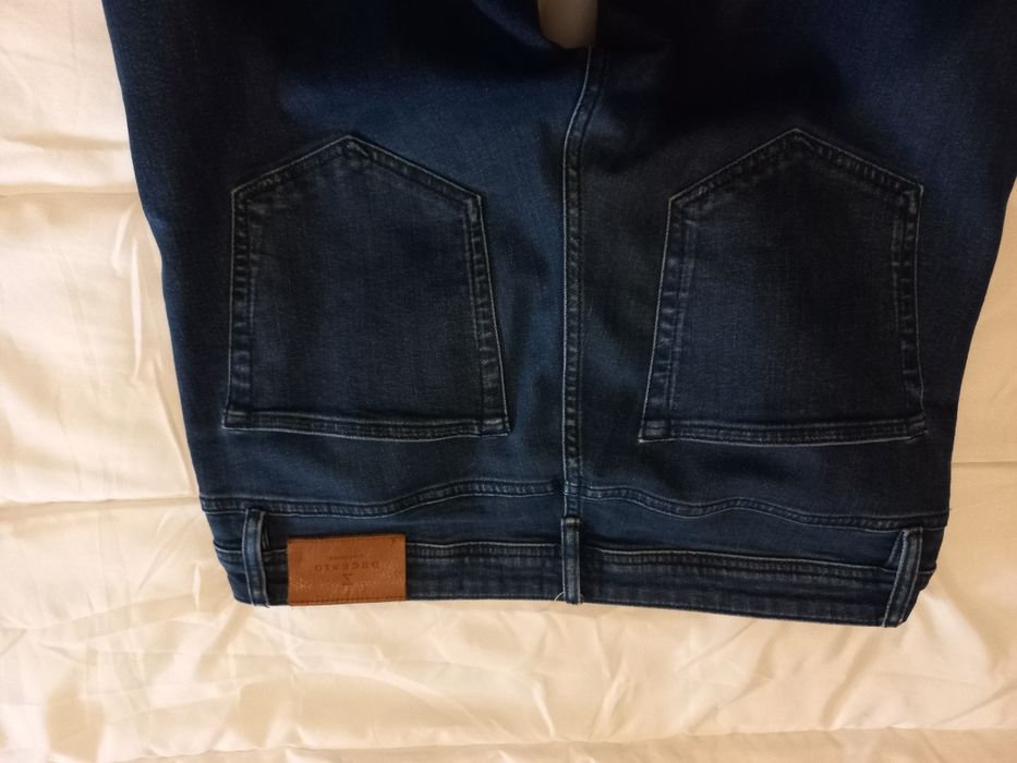 Calças de ganga como novas da Decenio