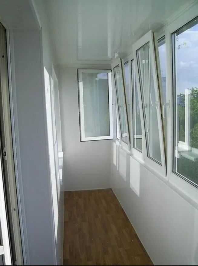 Пластиковые окна двери балконы