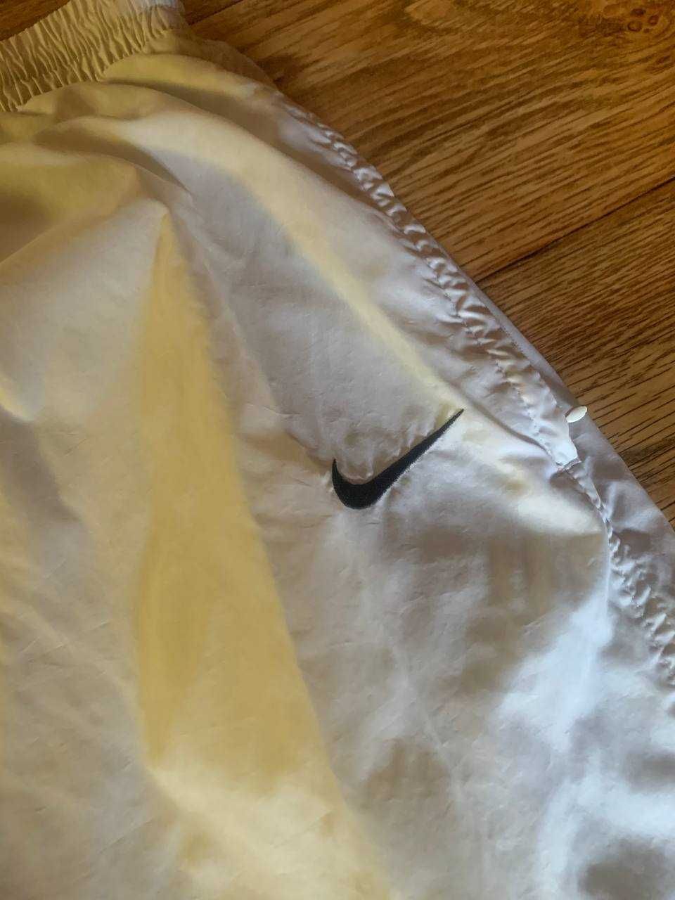 Нейлонові штани Nike