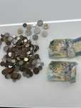 Conjunto de moedas e notas escudos