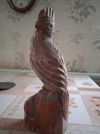 Продам деревянную статуэтку птичка