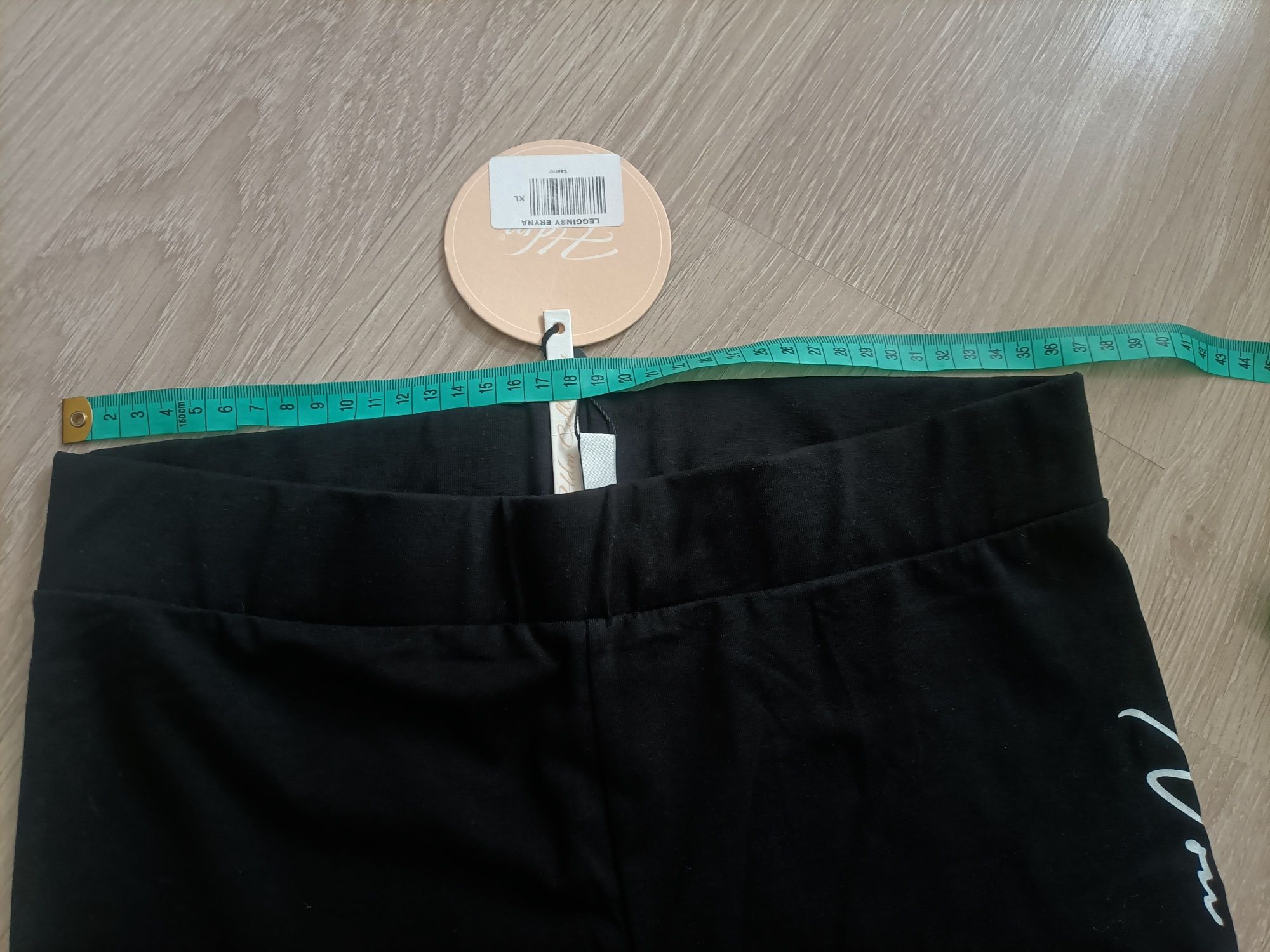 Nowe legginsy damskie z napisem po boku rozmiar XL