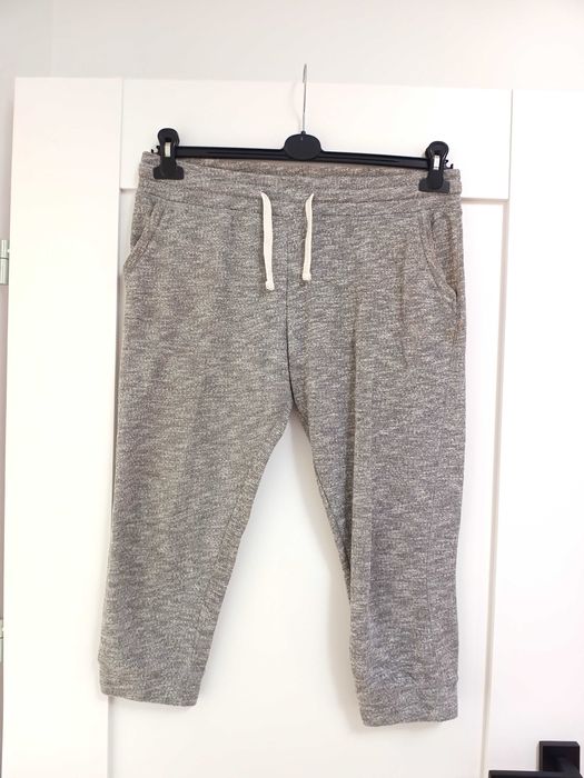 szare dresowe spodnie rybaczki damskie 3/4 krótkie na gumce 38m nalato