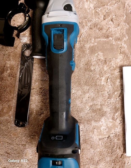 Акумуляторна оригінальна кутова шліфувальна машина.Makita DGA 511