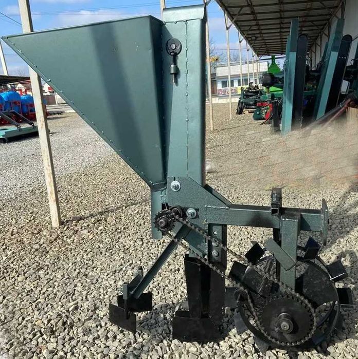 Часникосаджалка мотоблочна навісна ланцюгова рядна саджалка часнику