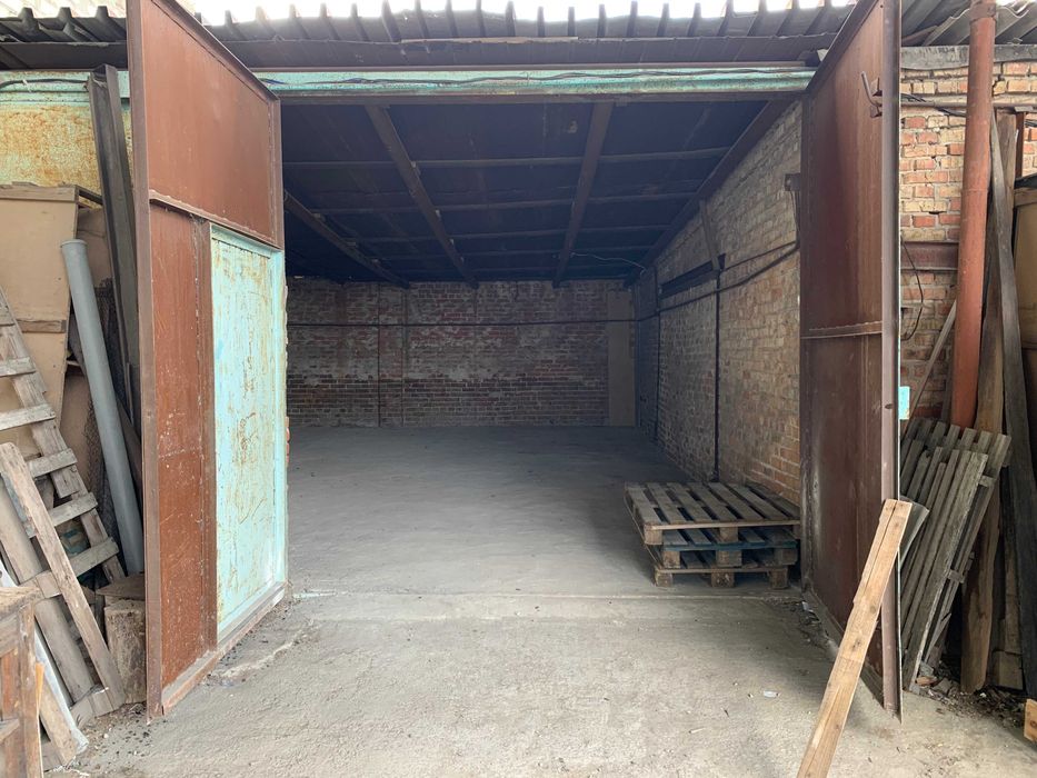 Здам гараж, приміщення під склад та офіс. Стоянка машин.