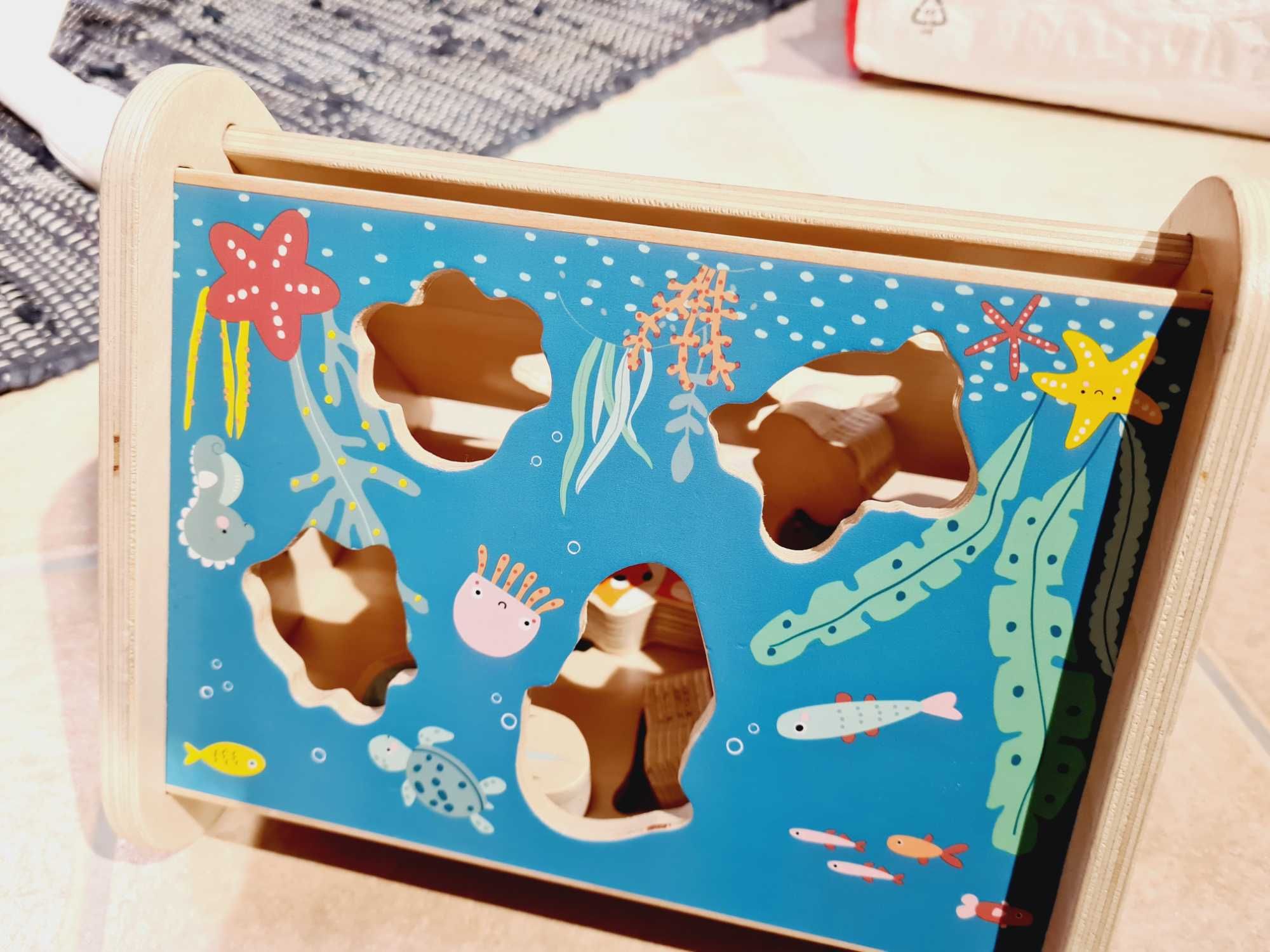 Brinquedo caixa com formas de animais