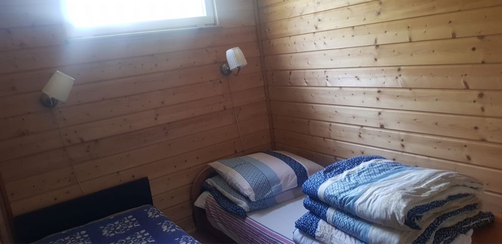 Domek 60m z kominkiem nad jeziorem z ogrodkiem i tarasem wakacje