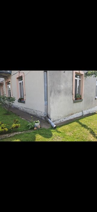 Продається квартира з прибудовою  та огородженою територією