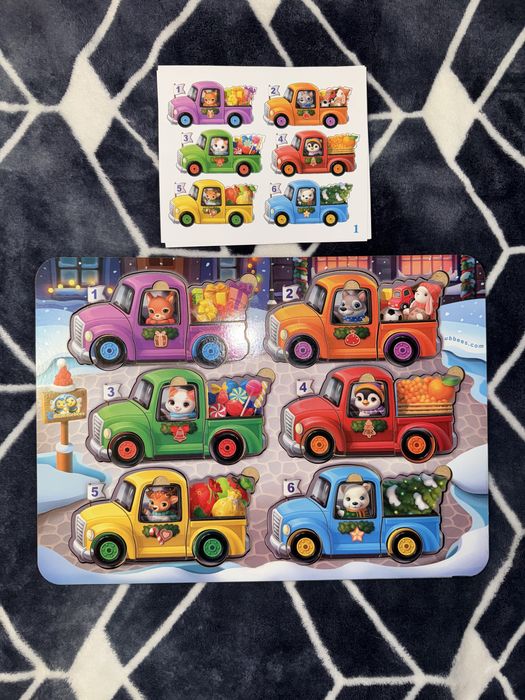 Розвиваюча гра, пазли-вкладки Тваринки на машинках.