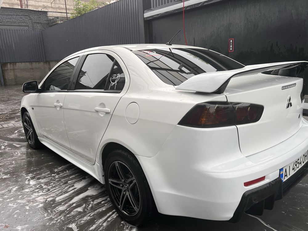Mitsubishi Lancer 2012 • 1.6 МКПП ГАЗ/БЕНЗИН
