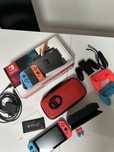 Nintendo Switch + 2 Comandos Extra + Acessórios