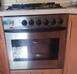 Kuchenka gazowa z piekarnikiem elektrycznym do zabudowy firmy Zanussi