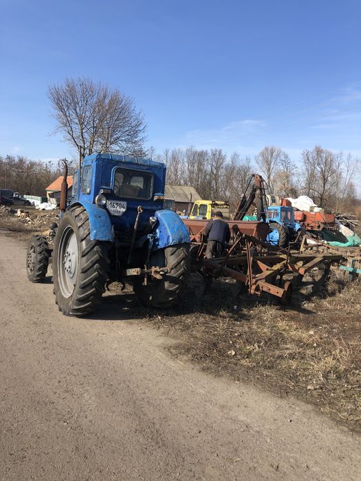 Продам трактор т-40 Ам з плугом та культиватором , з  документами .