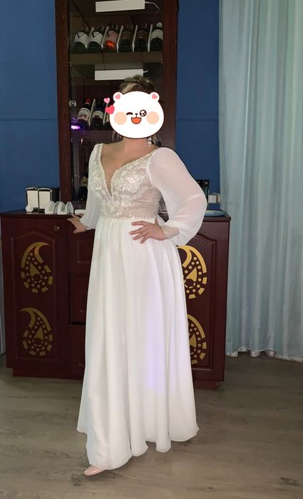 Весільна сукня в стилі бохо з рукавами