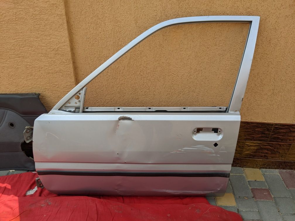 Передні ліві двері від Nissan Sunny N13