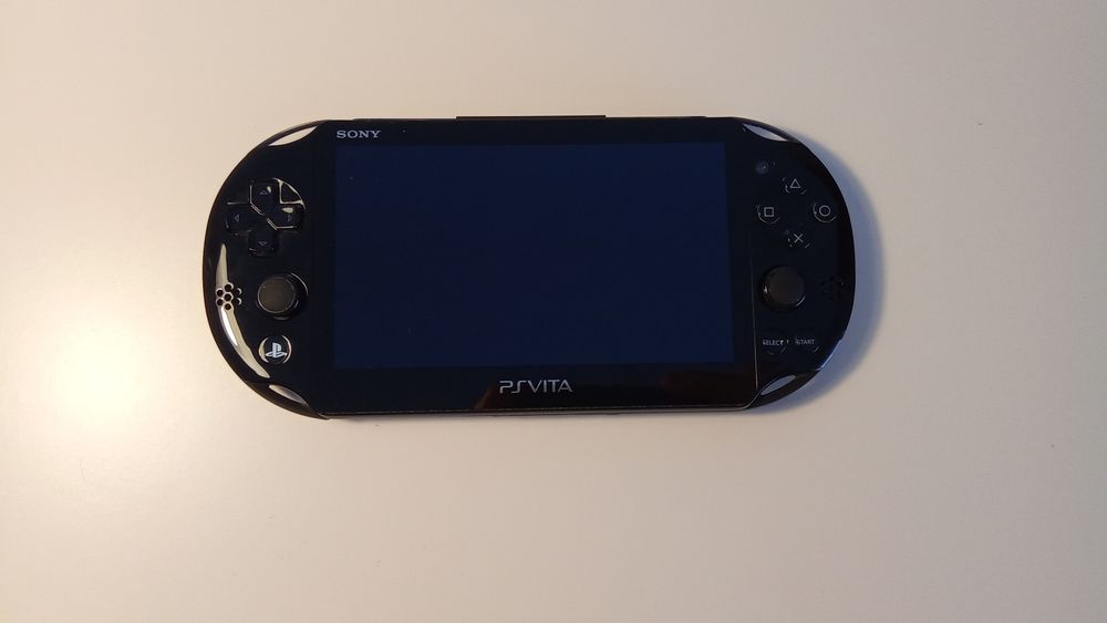 Ps Vita com 5 jogos , capa de transporte e carregador
