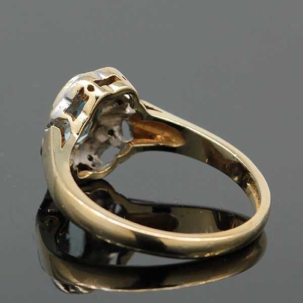 Złoty pierścionek z owalnym akwamarynem i diamentami delikatny 9K