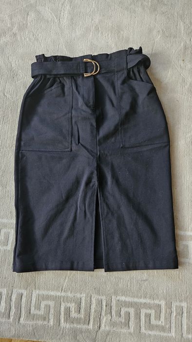 Спідниці нові чорна та маслянаа