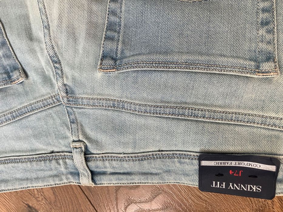 Jeansy Armani niebieskie