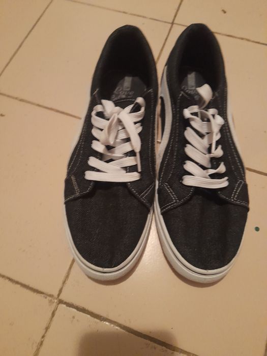 Tênis pretos homem usados em bom estado.