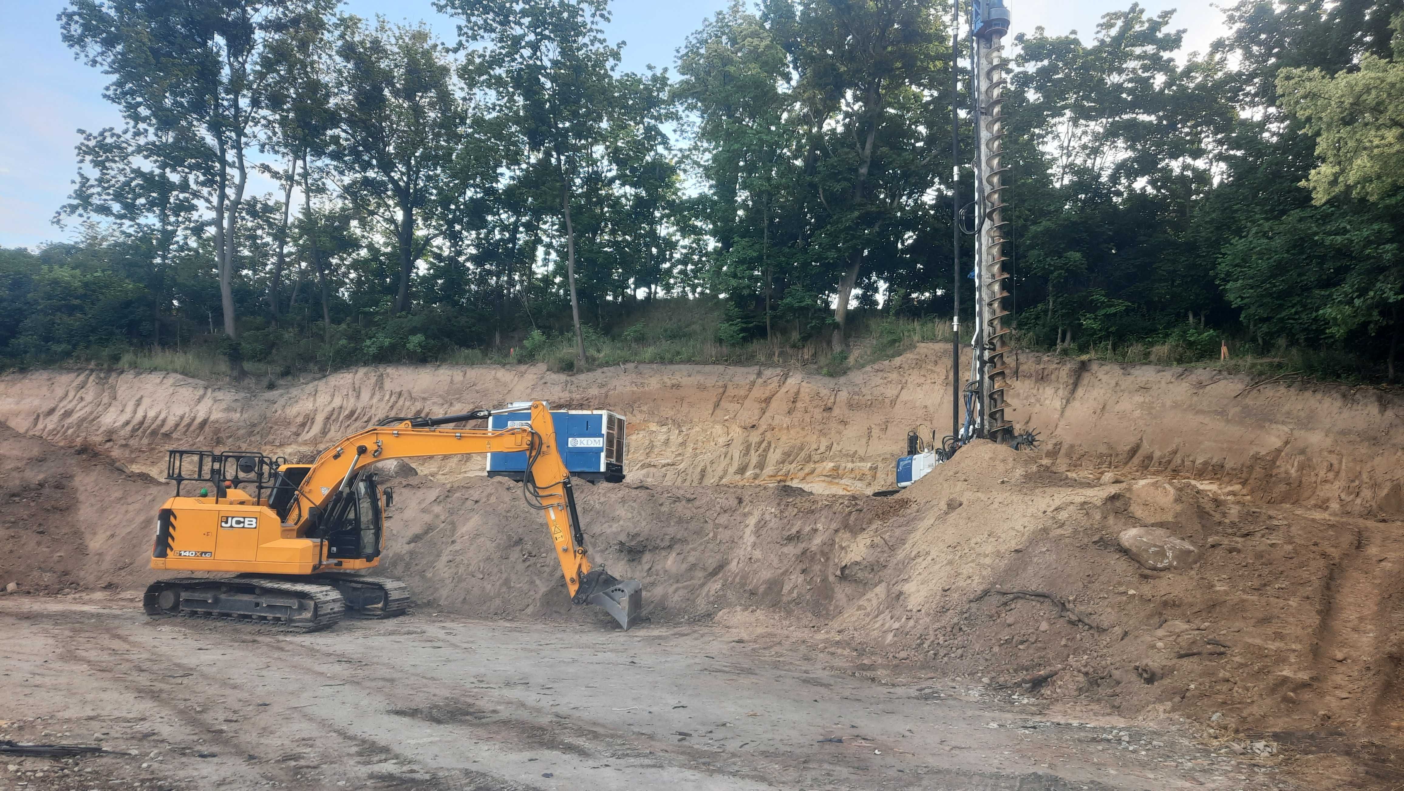 Transport koparka roboty ziemne uslugi ogrody minikoparka