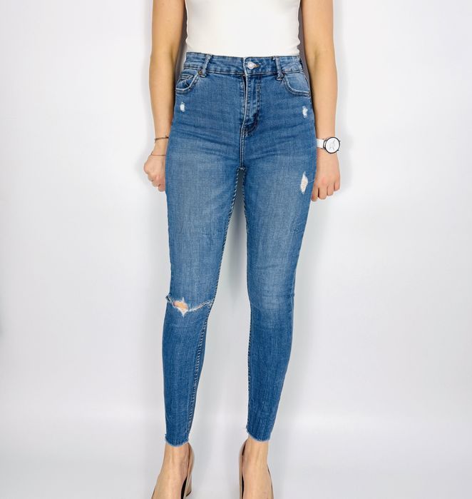 Jeansy skinny z przetarciami M 38 Denim Co.