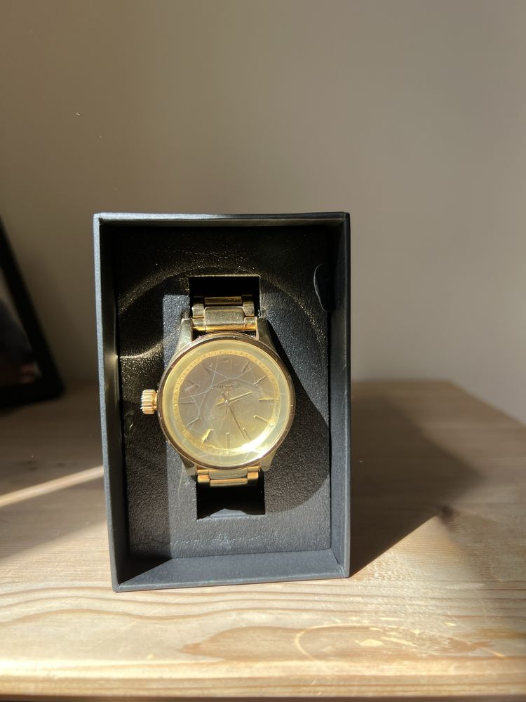 Relógio Nixon “The facet” Gold