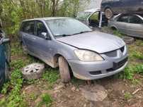 MITSUBISHI LANCER VII fotel fotele kanapa deska kokpit podsufitka boczek boczki klamka podłokietnik licznik
