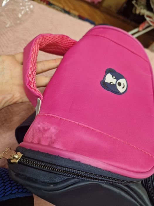 Новий портфель для дівчинки молодших класів