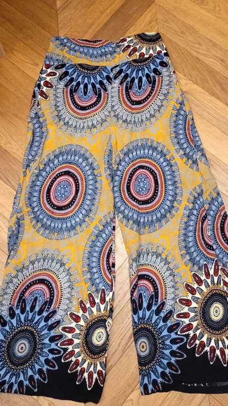 Zwiewne kolorowe spodnie boho 36/38