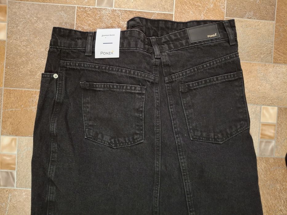 Джинсова спідниця з оригінальним дизайном