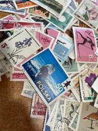 Vários lotes de 100 selos antigos da Polónia