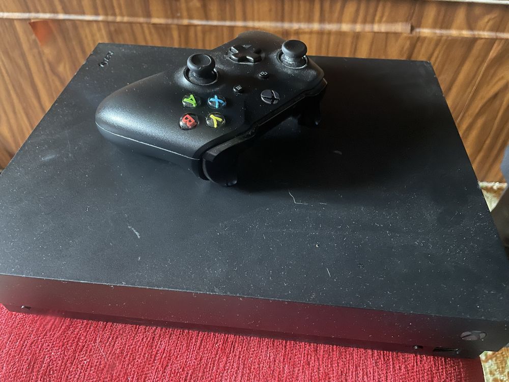 Продам xbox one x 1 tb