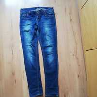 Spodnie jeansowe damskie Reserved roz W 30 slim fit