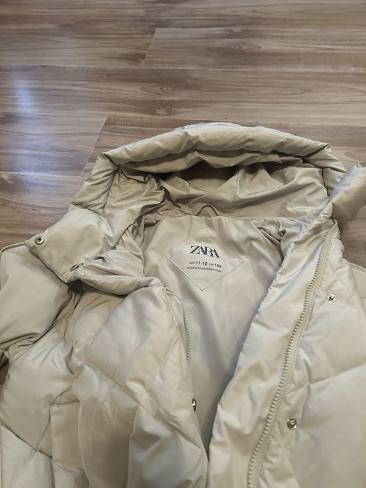 Жіночий пуховик ZARA