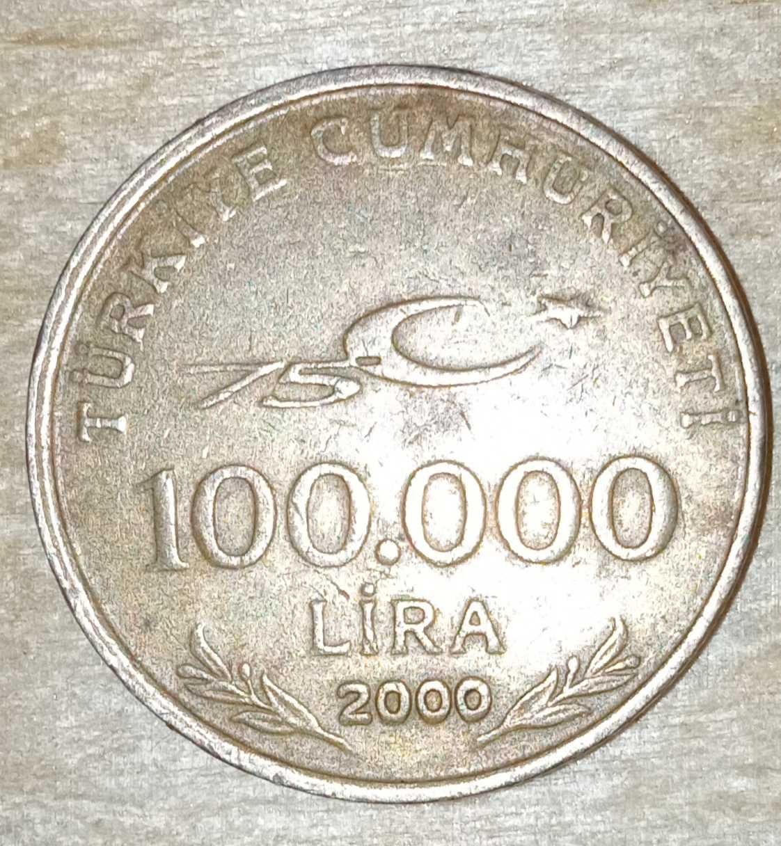 Монета100.000
Lira год 2000 перевертыш