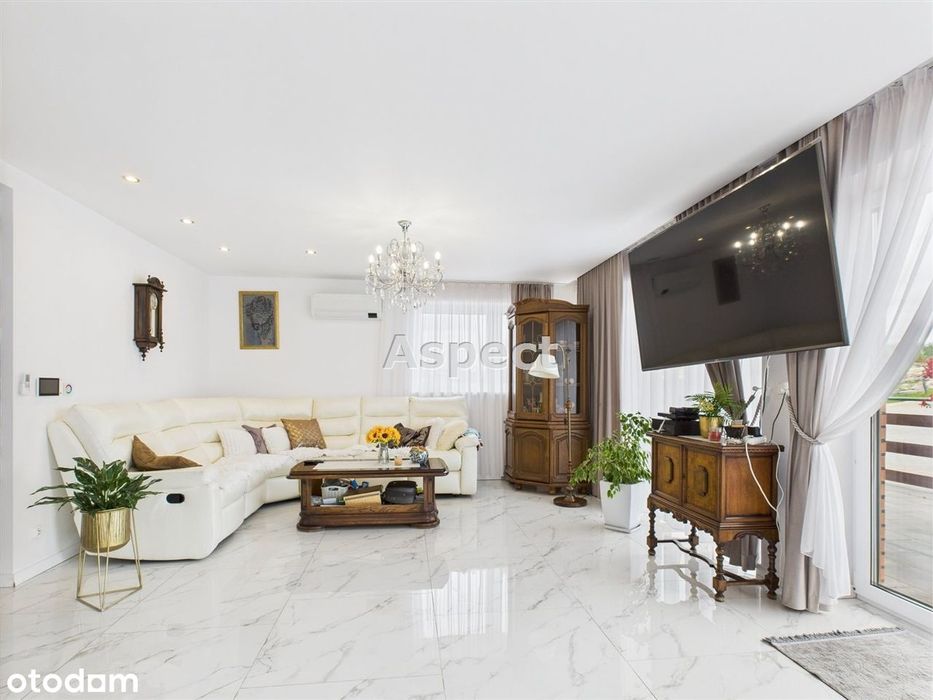 Mazurska rezydencja z tarasem nad stawem