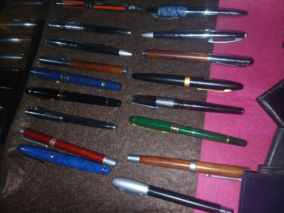 Lote de 32 caneta e 32 bolsa pele