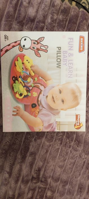 Розвиваючий килимок-подушка з брязкальцям