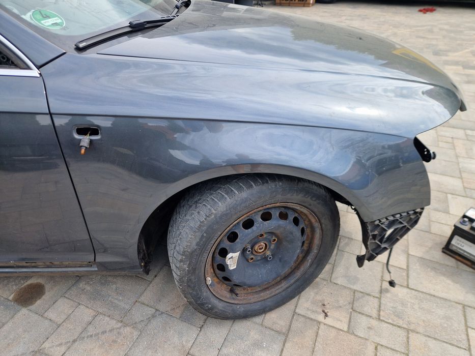 Prawy Przedni  błotnik Audi A6 c6 LZ7S -100%  oryginał lakier - super