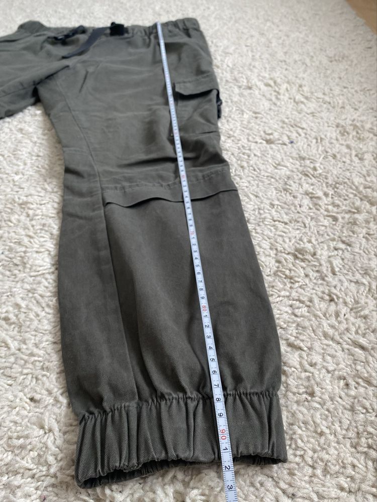 Zielone khaki spodnie cargo bojówki wojskowe z kieszeniami asos 38 M