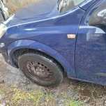 BLOTNIK PRAWY LEWY OPEL ASTRA H Y20Z BEZ MALOWANIA