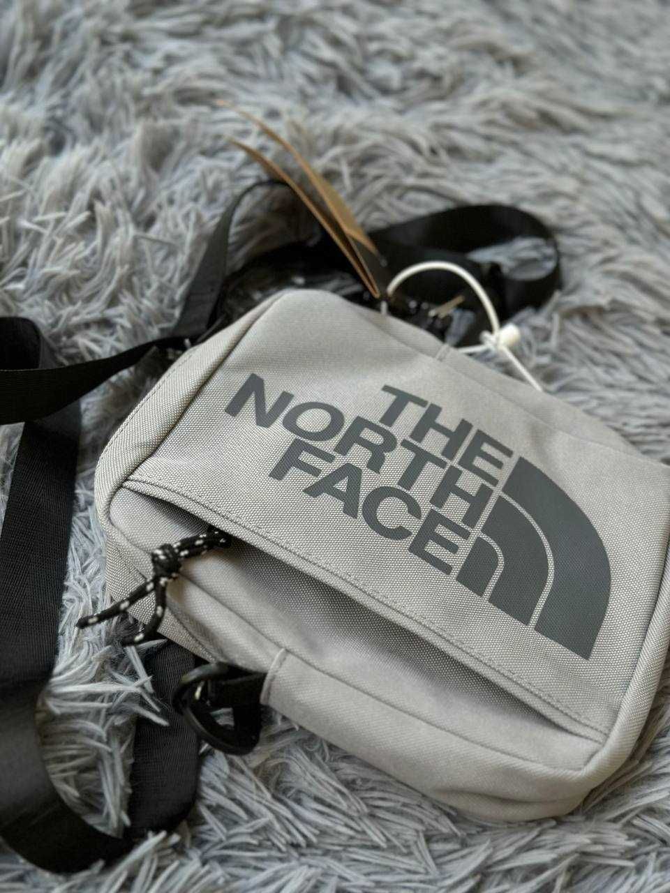 Сумка The North Face сірого або бежевого кольору