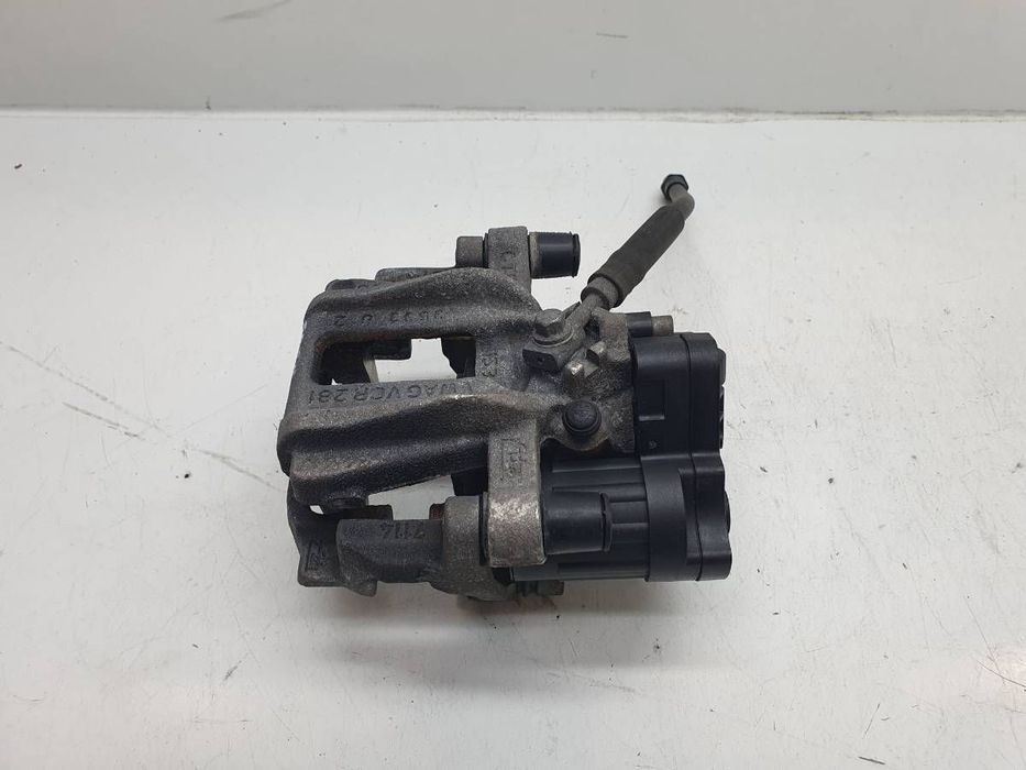 ZACISK HAMULCOWY TYŁ TYLNY LEWY JARZMO SKODA OCTAVIA IV LIFT 2.0 TDI