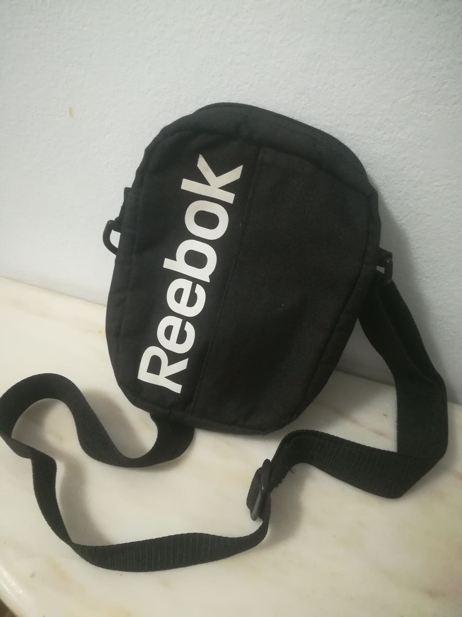 Bolsa tira colo Reebok