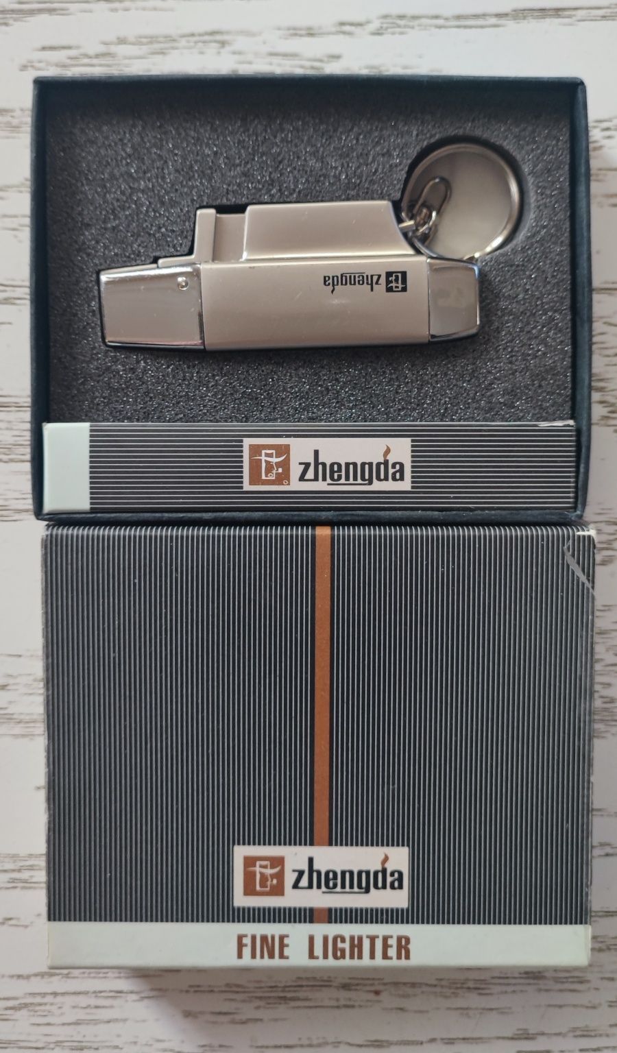 Зажигалка Zhengda